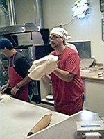 Skilled crust tossing technique