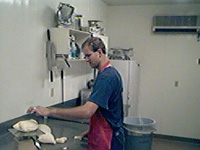 Rolling and kneading pizza dough